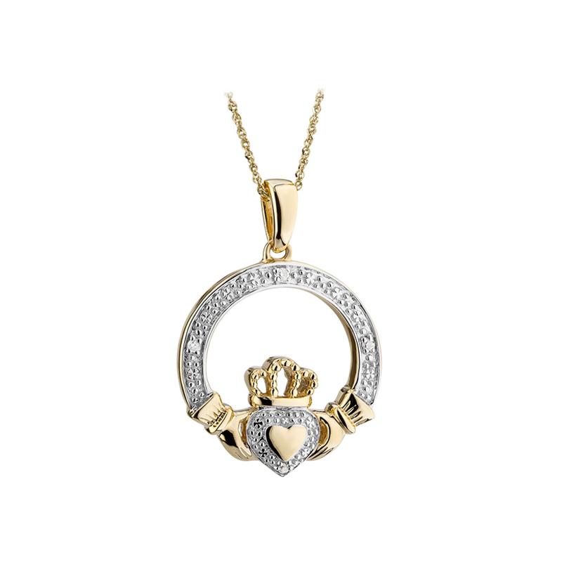 A necklace with a pendant featuring heart, crown, and hands, known as a Claddagh ring.