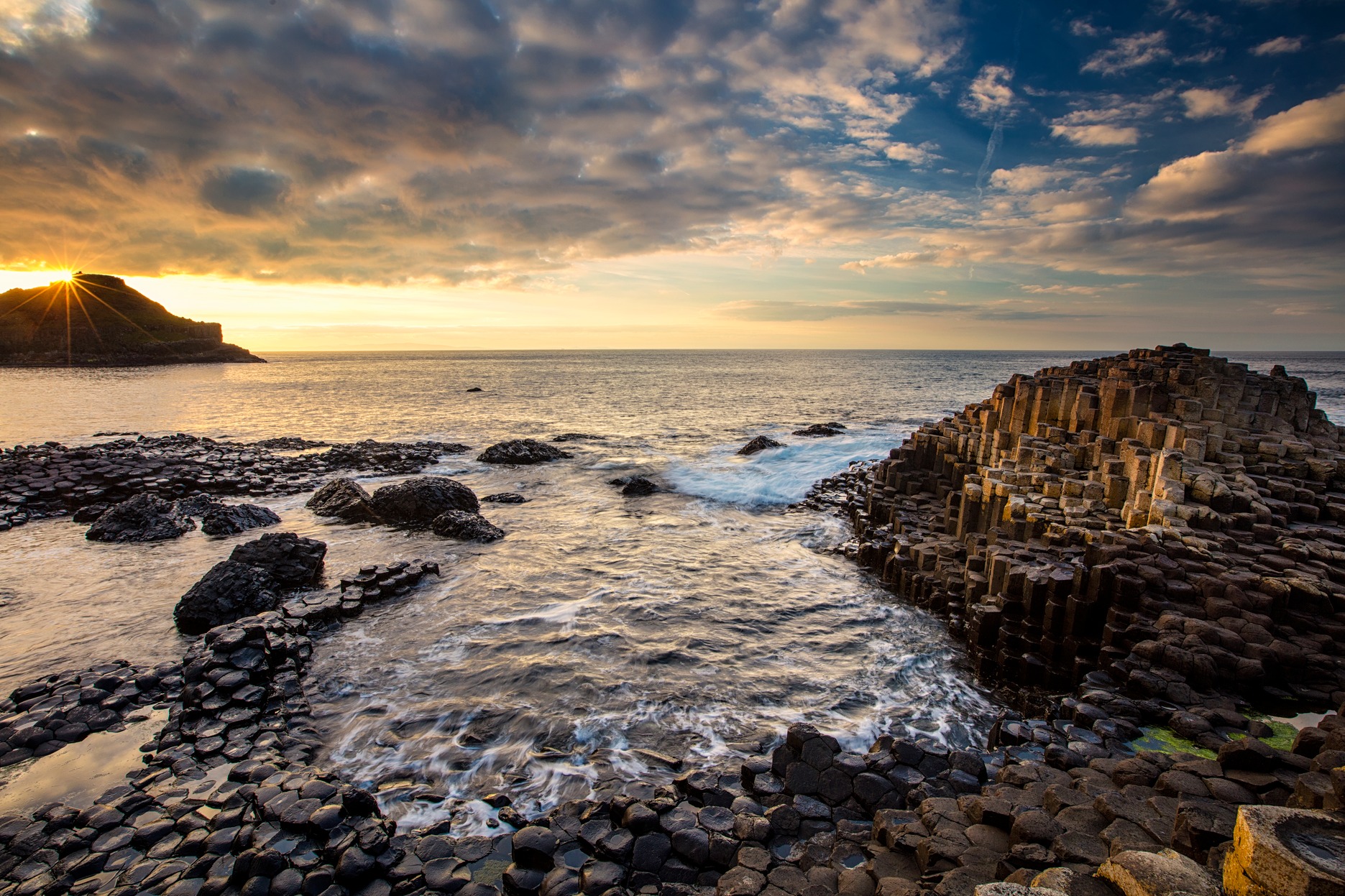 Giant's Causeway - hexagonal stone structures rise out of the sea